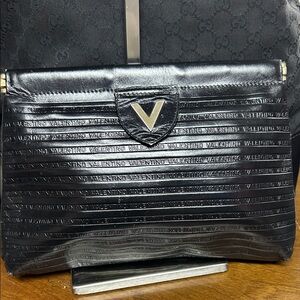 #48 Valentino Embossed clutch